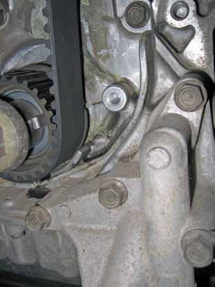 There is a white alignment mark on the belt that should line up with both the alignment mark on the pulley and the mark on the cylinder head cover. See Diagram 2, View C. 5.
