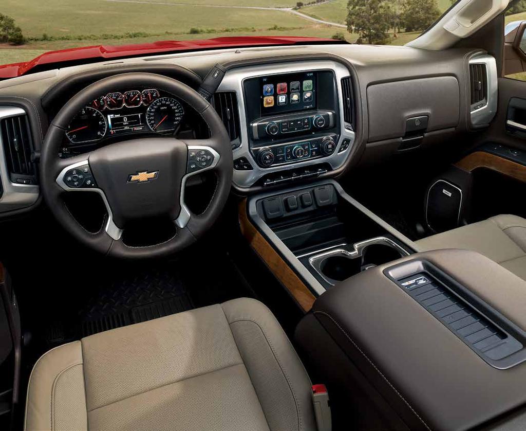 1500 Crew Cab LTZ interior in Dune with perforated leather appointments, Cocoa interior accents and available features. DESIGNED FOR ALL-DAY COMFORT.