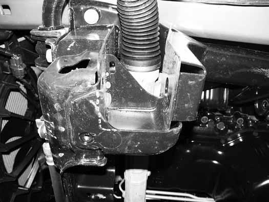 Go back and torque the two sub-frame bolts to 65 ft-lbs. 49. The front control arm mounting pockets must be trimmed slightly to install the front crossmember.