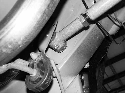 Install the adjustable end of the control arm into the frame pocket with a 3/16 thick washer (located in bolt pack # 744) between the outside of the frame rail and control arm bushings, make sure the