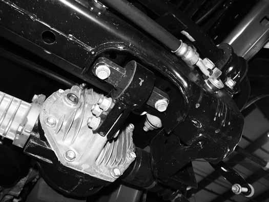 Mark the relationship between the front driveshaft and the transfer case output flange.
