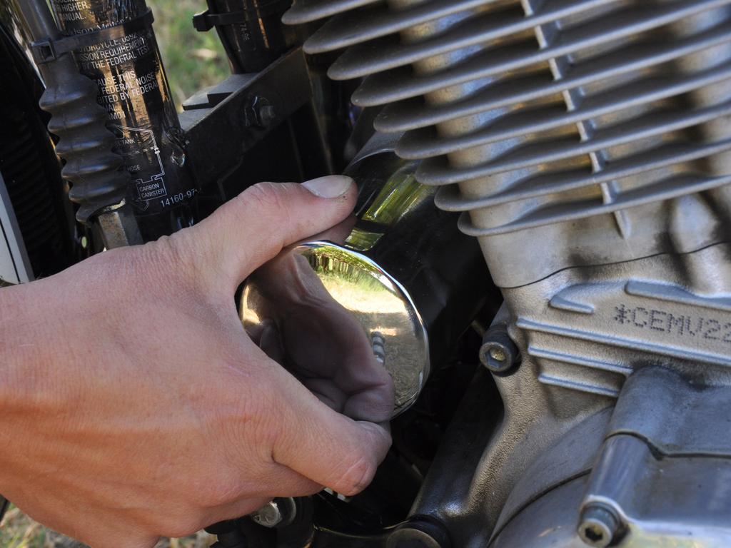 Step 5 Carefully thread your new oil filter into place, turning it in a clockwise direction.