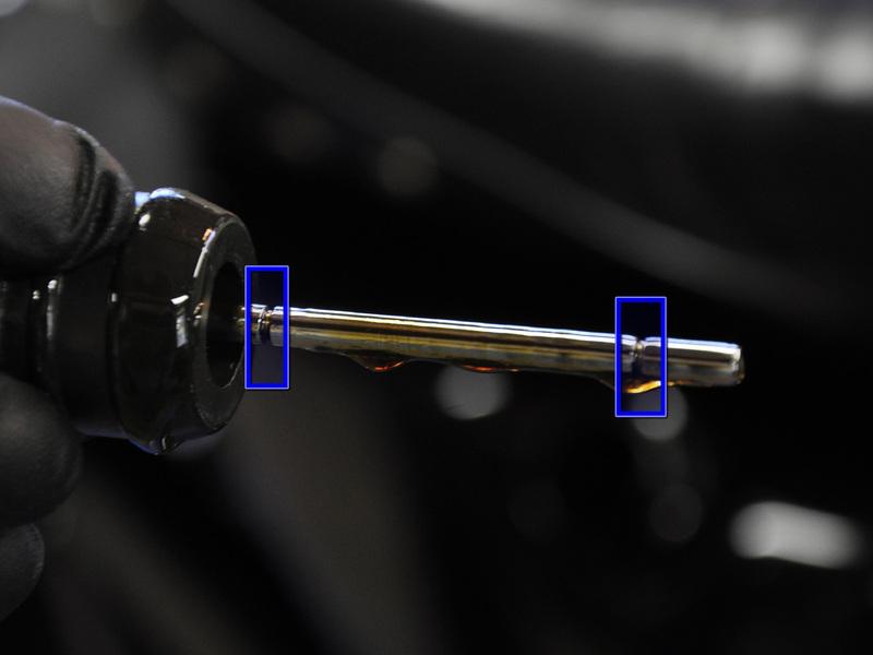 Use the oilcap/dipstick to check your engine oil level (holding the bike level if you have been working with your side-stand).