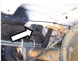 INSTALLATION Remove the original bump stops located above the rear axle.
