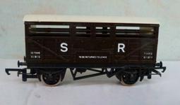 C.X and other markings. Excellent condition. Qty. 2 Each Price ( ): 15.00 3.144 00 Wagons - Tri-ang Tri-ang R122 Sheep Wagon, mid-brown with white roof, sides lettered 'S