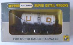 Other Railway 3.168B 00 Wagons - Wrenn Wrenn W4657 6-wheel Tank Wagon 'U.D.'. White on black base, staggered cradles. Mint, boxed Price ( ): 12.00 3.