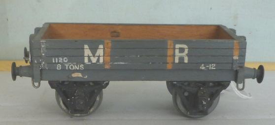 1.377 Unidentified (possibly L.M.C.) 2-axle 7-plank Open Wagon, bauxite brown, with N.E. professional lettering at corners and diagonal stripe. Non-lok buffers.