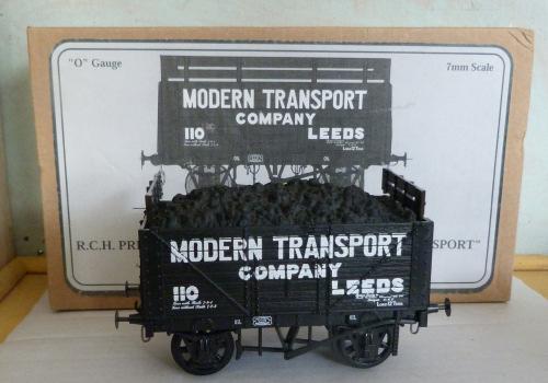 1.384 Unidentified Kit-built 2-axle 7-plank Open Wagon, wood construction, overall black with red lettering 'H.T.C. Engineering, Plymouth'. Fine scale wheels fitted. 1.