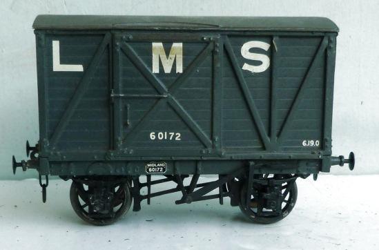 1.396 Unidentified kit-built 2-axle Cattle Wagon, plastic-moulded base and sides, finished in grey 'L.M.S.'. Spoked fine-scale wheels fitted. Qty. 3. Price each 1.