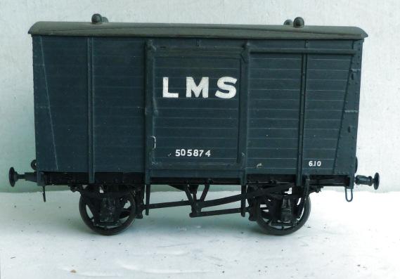 398 Unidentified kit-built 2-axle Closed Van, plastic-moulded base and sides, finished in dark grey, L.M.S. 505874 in white lettering. Fine-scale wheels fitted 1.