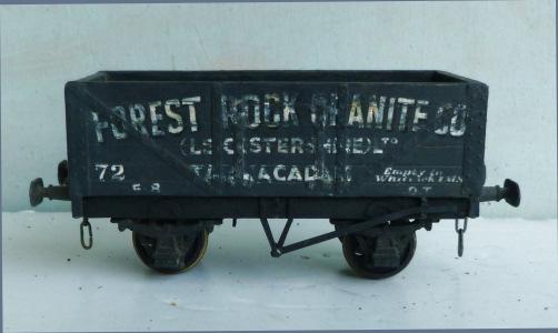 1.400 Unidentified kit-built 2-axle 5-plank Open Wagon, wooden-bodied with metal axle frames, finished weathered black 'Forest Rock Grantite Co'. Scale-wheels fitted 1.