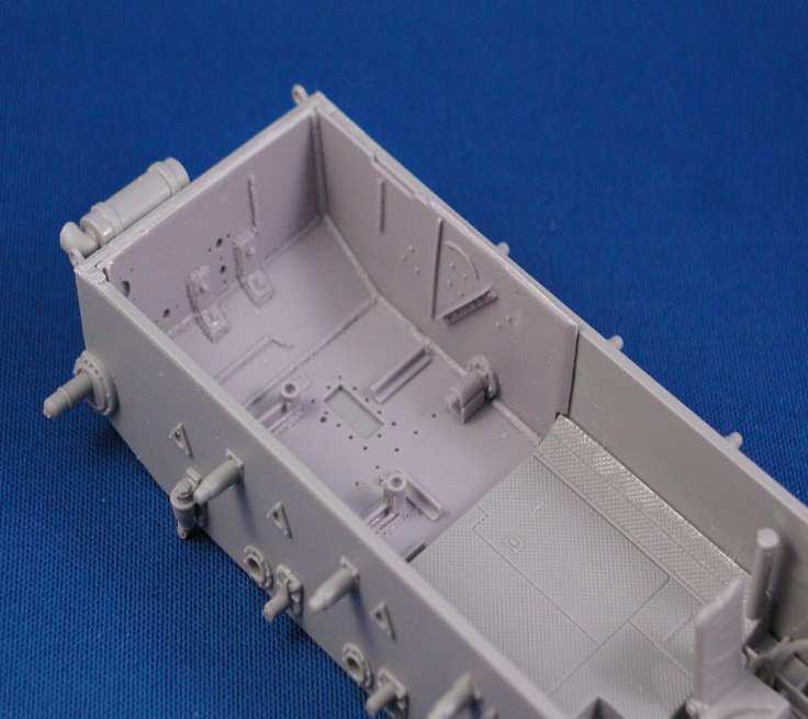 Once the upper hull is installed this raised portion sits flush against the upper hull and completes the compartment.