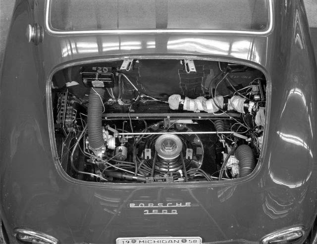 Above: The Chevy flat six in the Porsche test car. Below: The Vauxhall Victor being given a rear engine. developed for the project carried Holden parts numbers.