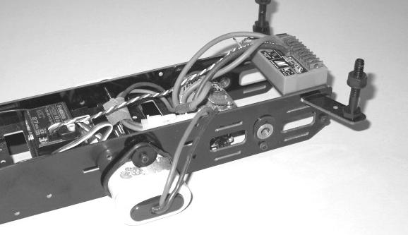 THE CHASSIS SIDE AND RUN YOUR ANTENNA WIRE UP THROUGH IT. YOU CAN MOUNT YOUR RADIO RE- CEIVER AND ESC ANYWHERE THAT IS CONVENIENT TO GET THE WEIGHT DIS- TRIBUTION AS DESIRED.