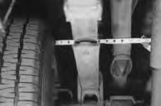 If necessary (in cases where your leaf springs are sagging badly), use a jack to raise the rear end so that the vehicle achieves the lowered ride height.
