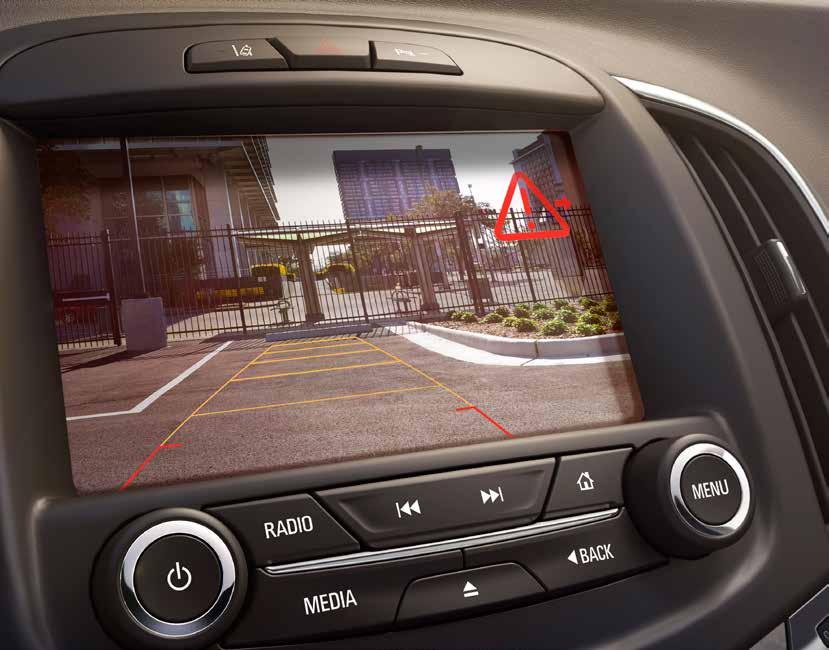The system alerts you audibly and by flashing a warning signal on the Rearview Camera screen. And if equipped with the Safety Alert Seat, the left or right side of the seat bottom will vibrate.