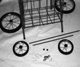 ASSEMBLY INSTRUCTIONS FOR BACK WHEELS. Remove the plastic bag from the Four Wheel Cart. See Figure A.