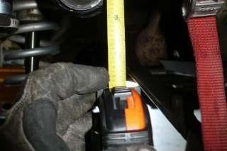 Torque bolt to 125 ft-lbs. b. Reattach track bar at axle side, following the mfg s specifications for torque specs: i.