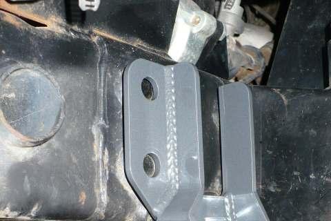 4) Next, install the PPM-8069 Track Bar Brace by fitting it over