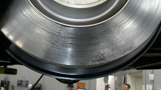 8. There are pad marks on the brake disc as a result of brake pad material transferring to the discs (Figure 5).