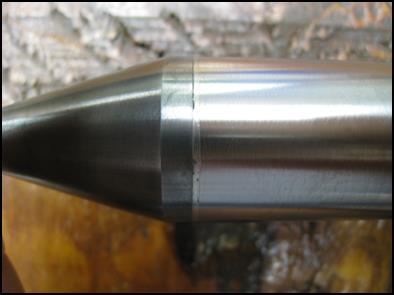 If there is any wear on the sealing surface, replace the stem. Inspect the carbide tip of the stem.