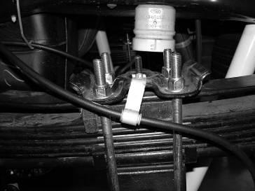 Using the supplied u-bolts, nuts, and washers align axle, lift blocks, and springs and torque to U-Bolts to 180 ft-lbs.