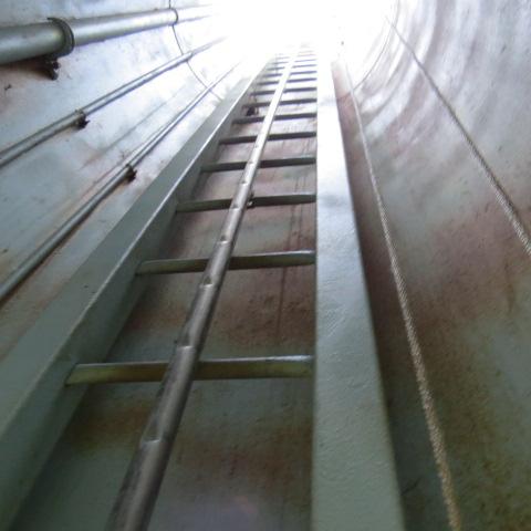 Subject: View of access pipe and ladder from chamber