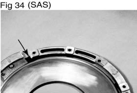 Clutch Cover / Intermediate Plate Failure - Aluminum Spacer Ring on the Intermediate Plate is Broken (Eaton Fuller Solo and Stamped Angle Spring 1402 only) As shown in Figure 34 (see arrow), the