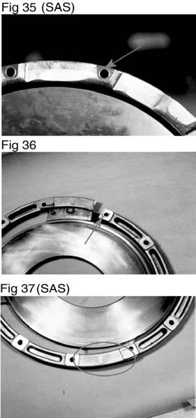 Note: The cover assembly mounting hole pads (see arrow in Figure 35) have made an indentation (see arrow in Figure 36) onto the spacer ring mounting hole pads (flywheel side).