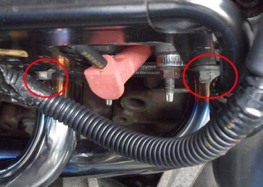 Remove Passenger Exhaust Manifold: -Using a 13mm socket, remove the (6) mounting nuts on the exhaust manifold.