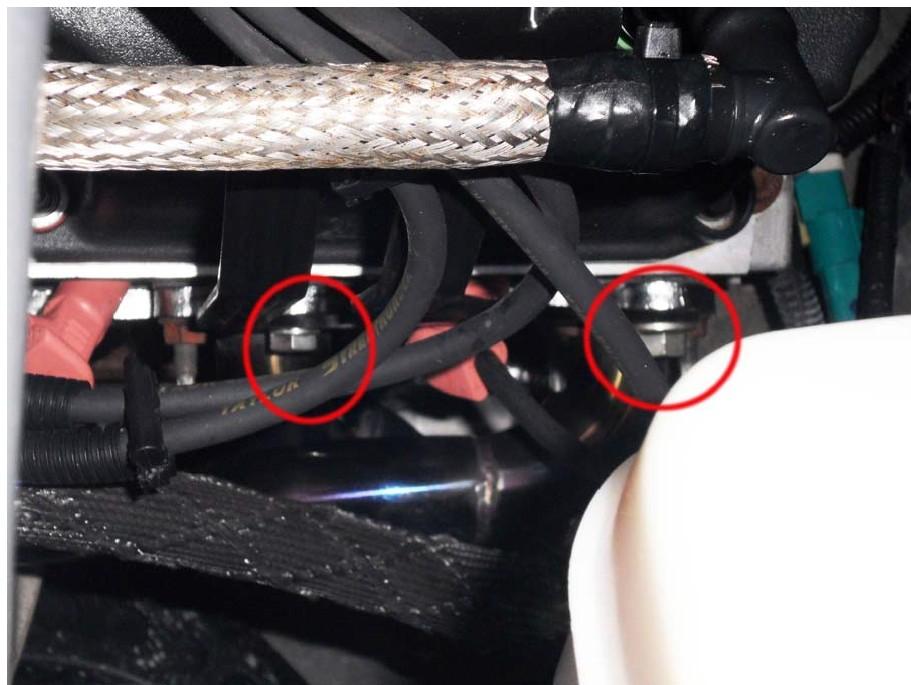 -Using a 15mm socket, remove the large bolt securing the coil pack bracket to the manifold (closest to firewall).