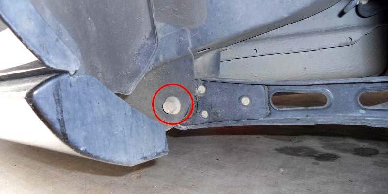 Remove the front (Figure 5) and rear (Figure 6) bolts for one of the