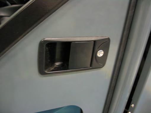 OPERATION DOOR LOCKS The cab doors can be locked from either inside or outside the cab.