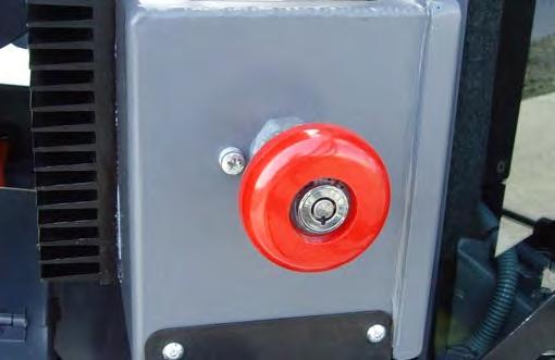 Inside cab: Move the lever back to lock the door. Move the lever forward to unlock the door.
