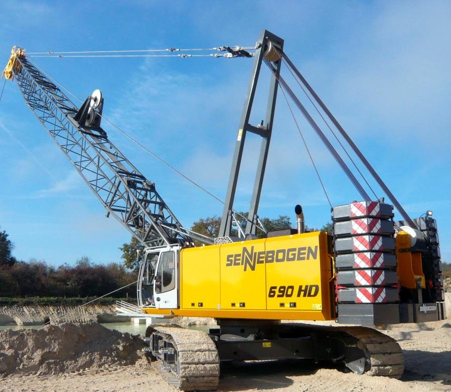 Lattice Truck Crane Crawler models are often equipped with hydraulically extendable tracks and oversize pads.