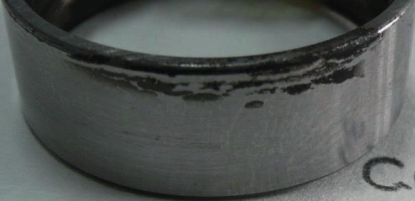 Defect: - Corrosion, unused bearing Causes: - Rust on new, unused bearing, caused by improper