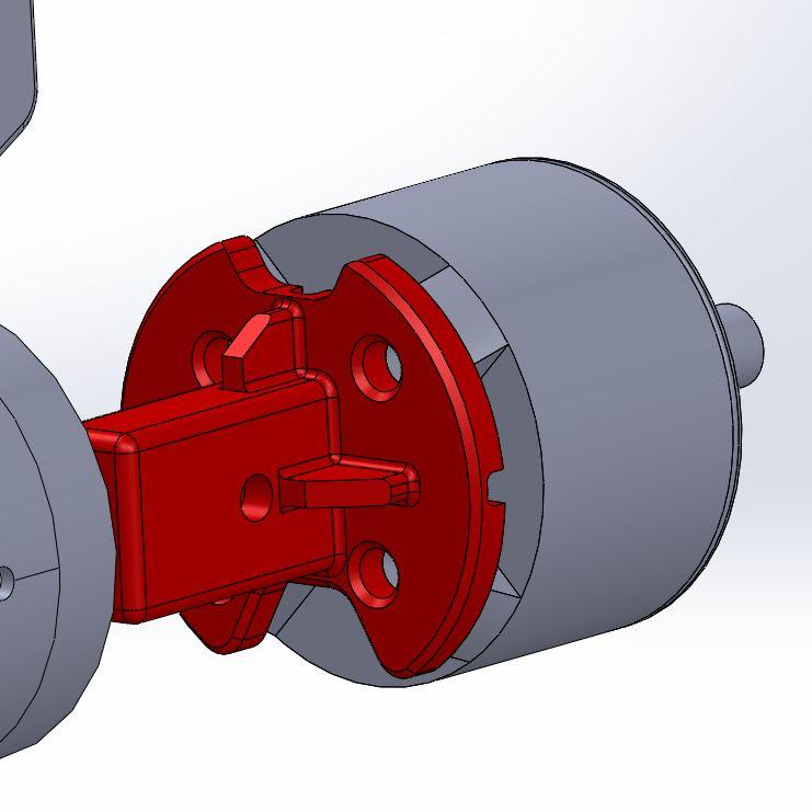 Carefully push the motor wires through the bottom of the motor mount receiver while