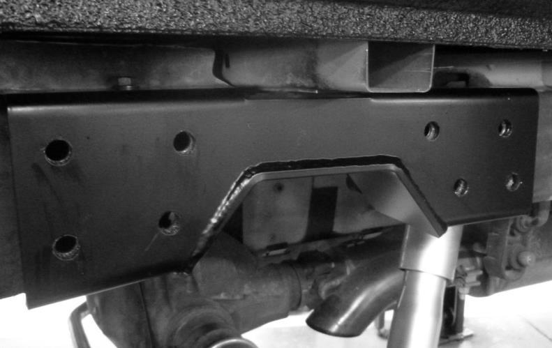 not to damage any lines or other components located behind the frame rail. Avoid creating any sharp corners or other defects that may cause unnecessary stress-concentrated areas in the frame rail.