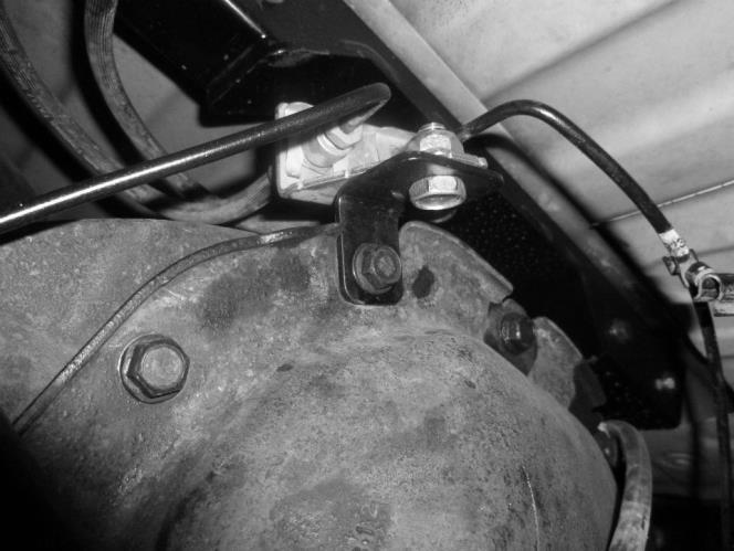 (Photo 22). 4t) Remove Factory brake line bracket from differential cover.