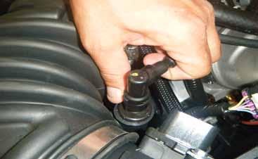 5. Remove the two (2) nuts that hold the airbox in place using a 10mm deep socket. 6.