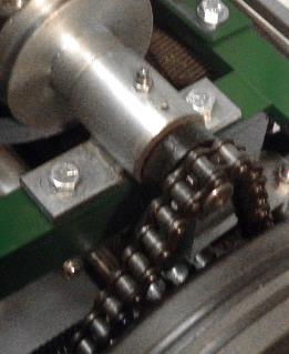 - Check roller chain tension once each week.