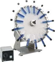 FRICTION-DRIVE TEST TUBE HEAD This aluminum disk is equipped with spring clips to hold test tubes for such operations as: blood agitations isotopic competitive protein binding assays A clutch permits
