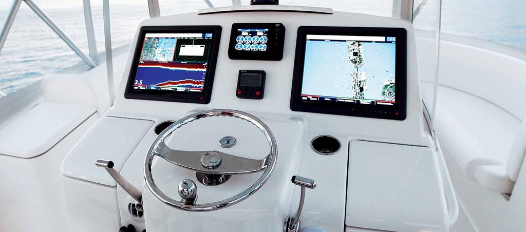 The command bridge features an island helm station, with flush mount electronics capability, dual Release Marine Teak captain s chairs with footrests, forward center bench seat, matching port and