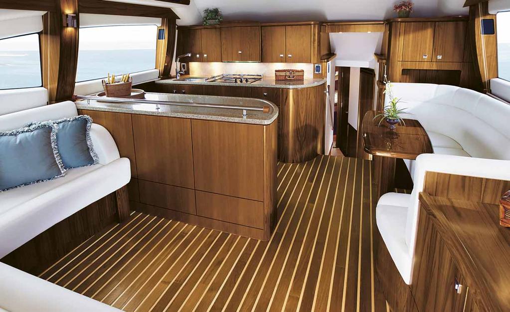 Carpet is standard throughout the staterooms and hallway (Teak or Teak and Holly floor available), and both heads have tile flooring.