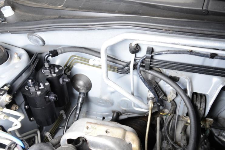 7. Some late model Subarus will have an electrical connector tube (shown) on the OEM hose that routes to the turbo inlet pipe.