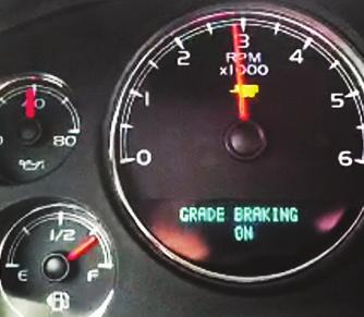 GRADE BRAKING ENABLED or GRADE BRAKING ON displays when the system has been enabled with the Tow/Haul button.