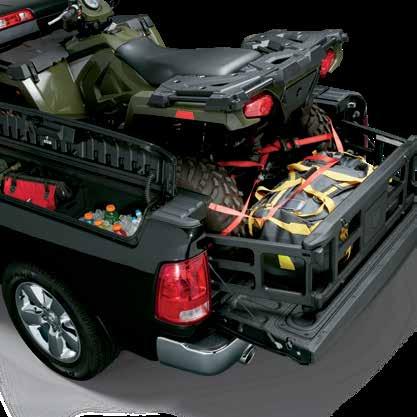 The adjustable and lockable bed divider/bed extender fits on the lowered tailgate, increasing the