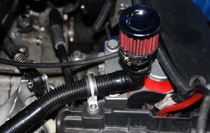 INSTALLING THE NEW XAS INTAKE SYSTEM Step 15: Line the two flats in the filter adapter up with the two tabs in the