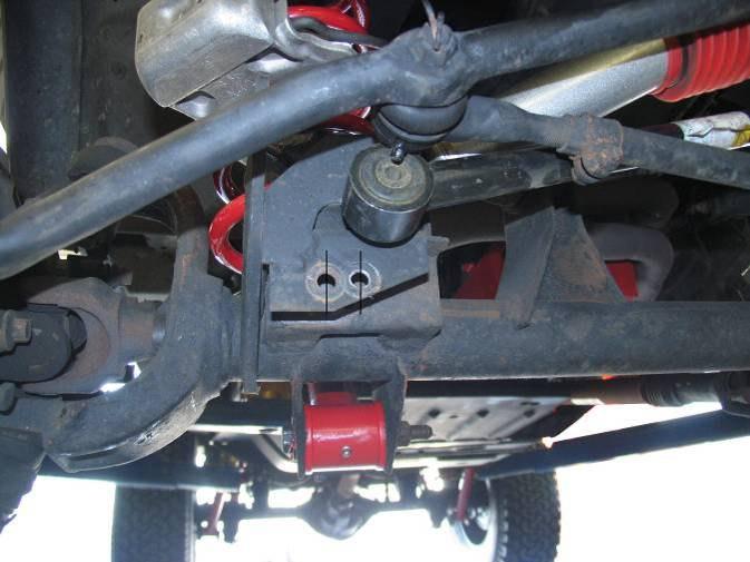 ¾ Figure 5 5) Install new Rancho suspension link 1335 to the frame and axle brackets as shown in figure 6.