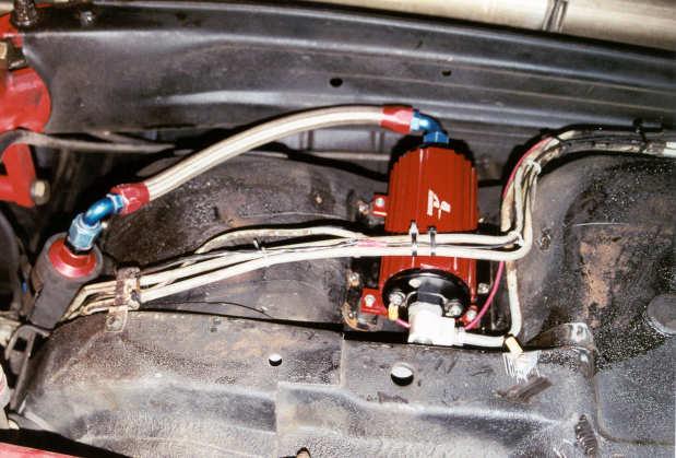 With the fuel filter in its desired position measure the amount of braided hose needed to connect the fuel filter to the fuel pump, using the two supplied 90-degree AN-10 hose ends as a